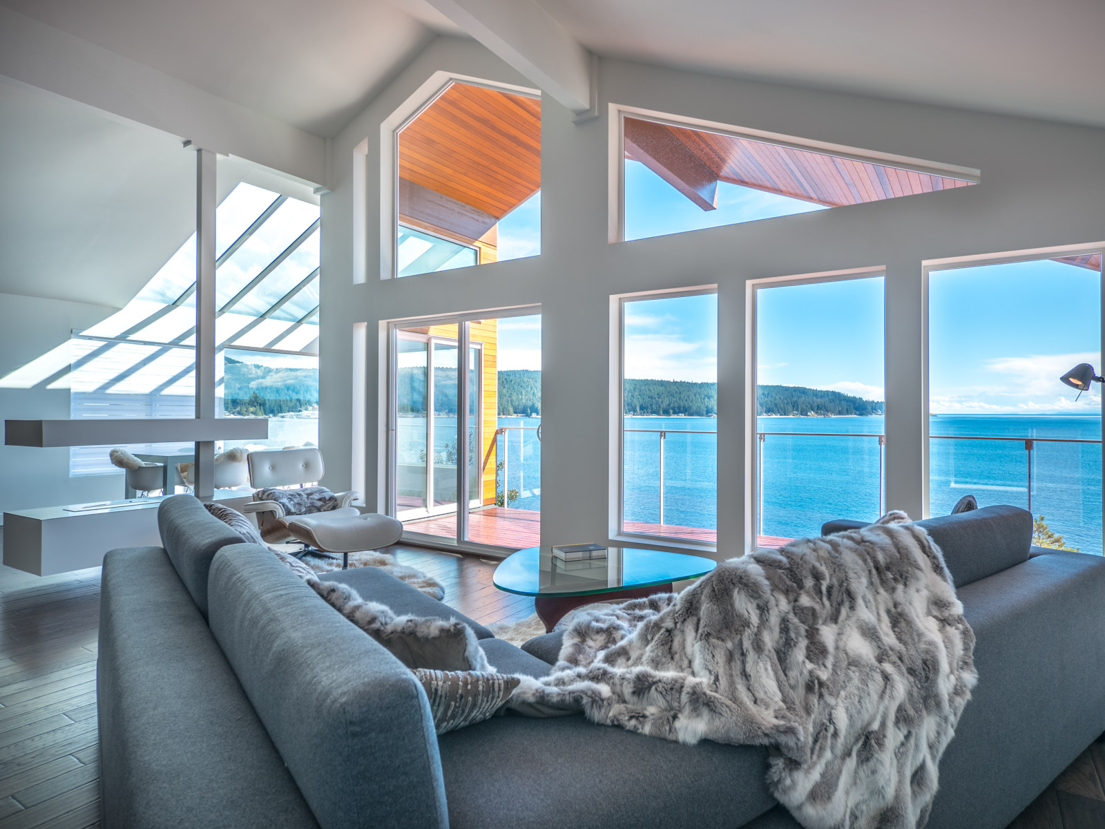 Vaulted living room overlooking ocean