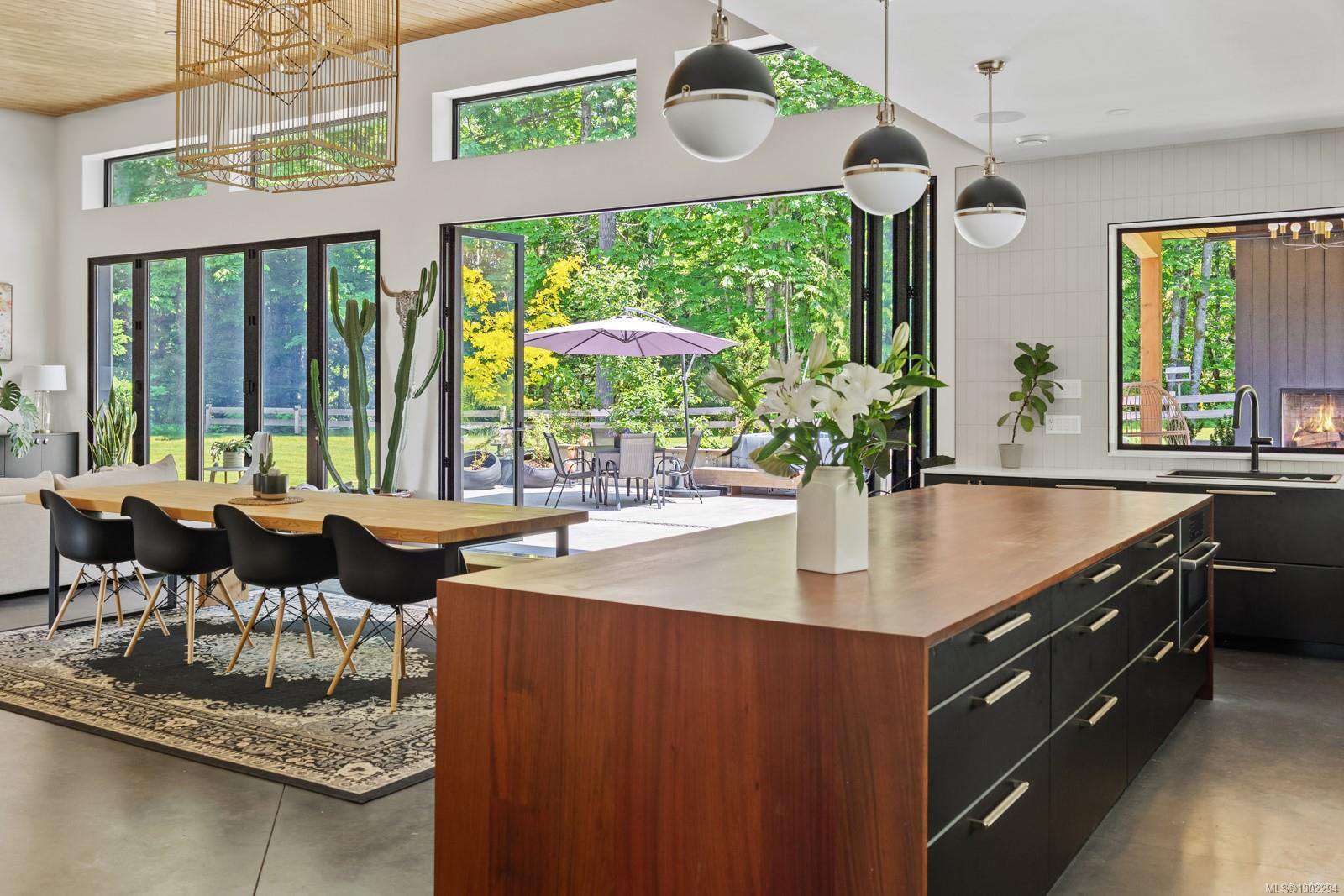 Open-concept living and dining with kitchen island